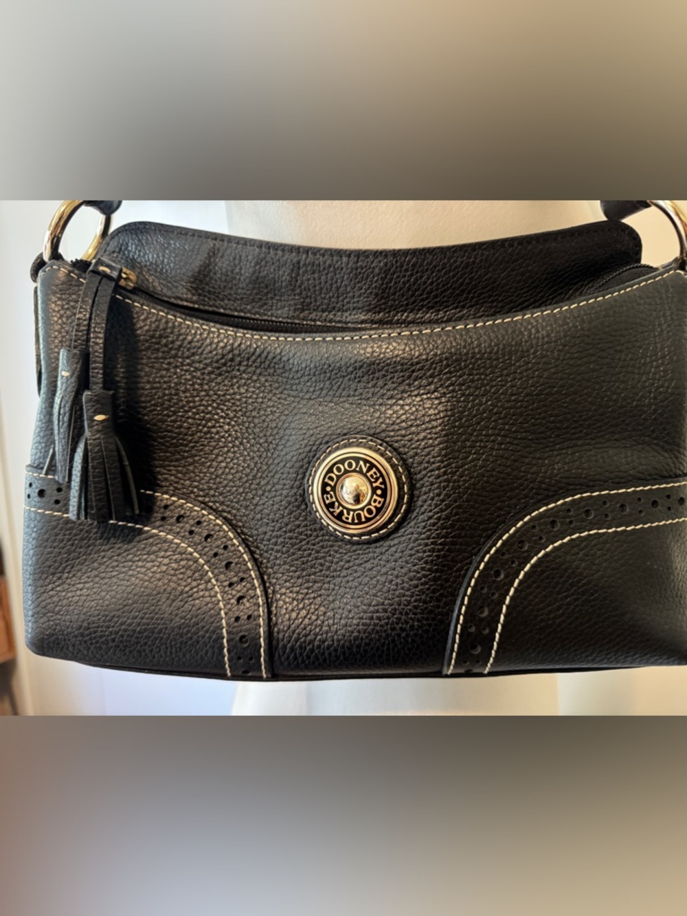 Dooney & Bourke vintage Black Pebbled Leather Shoulder Bag with Tassel